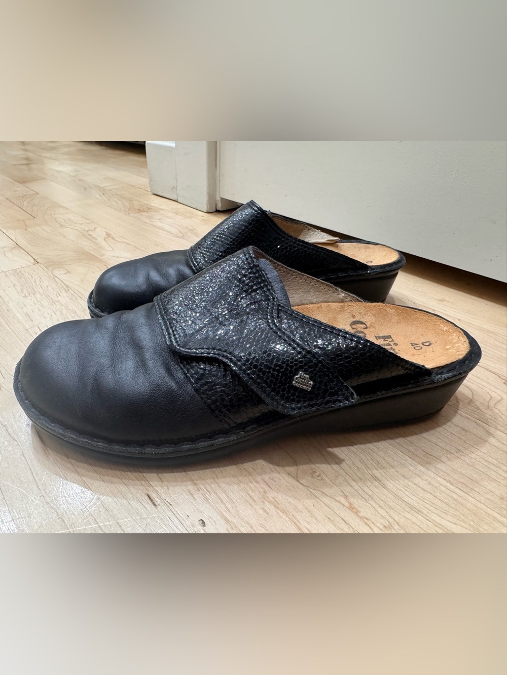 Finn Comfort Women’s Amalfi Black Clogs with Snakeskin Design